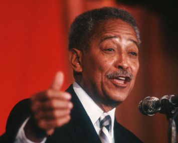 A man speaking at a podium.