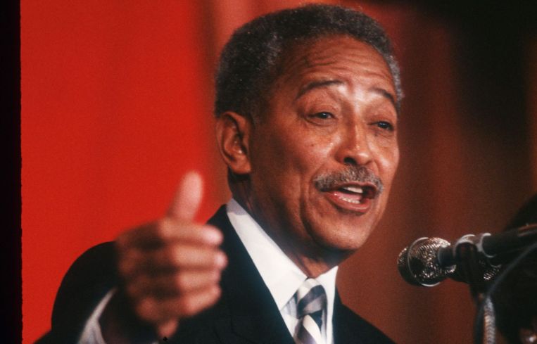A man speaking at a podium.