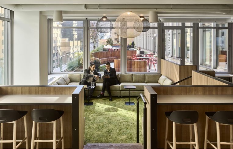 Work spaces are organized into "neighborhoods" themed around different colors, like green, blue and teal.