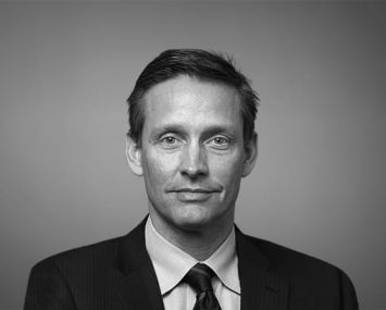 A man smiling into the camera.