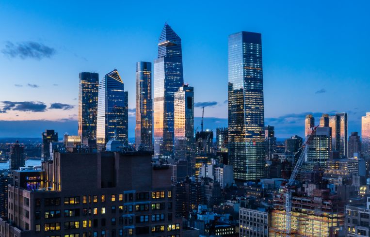 A wide shot of tall, glassy towers.