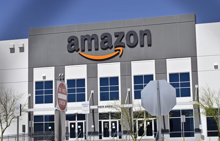 The main entrance to an Amazon distribution center. Amazon’s continued expansion comes as online shopping and e-commerce activity surges in the U.S.