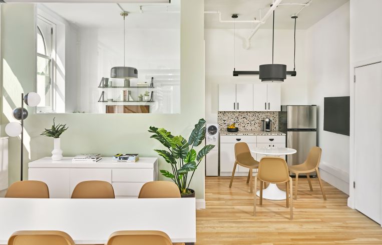 A half-glassed in office allows an executive to see out into the office without feeling like they are in a fish bowl.