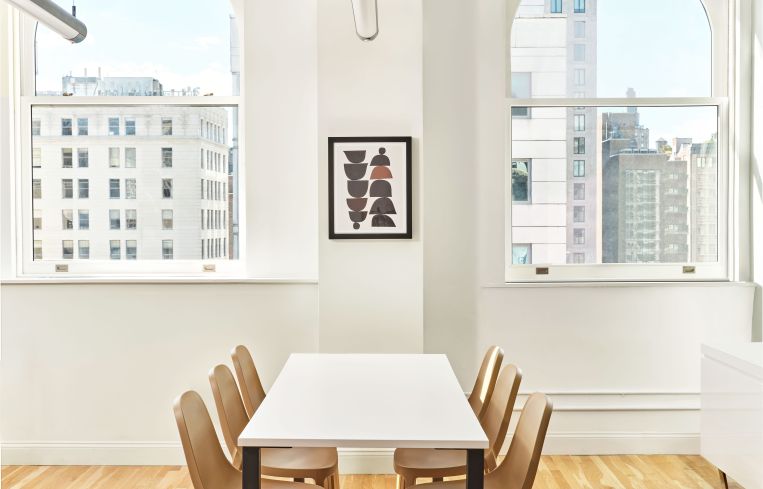 An open group meeting area for employees.