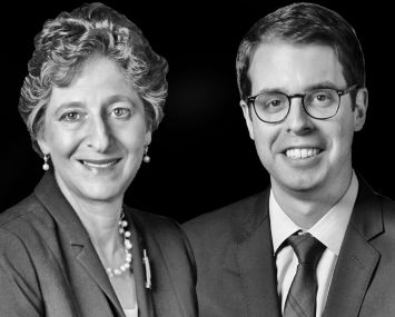 Elise Maguire and Adam Taubman.