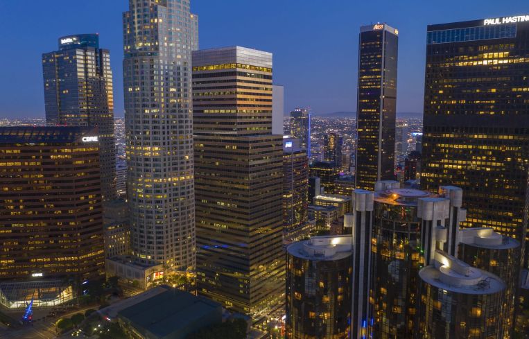 An aerial view shows high-rise office buildings that have been absent of workers more often than not since March 2020.