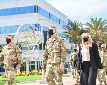 Gen. Jay Raymond (left), U.S. Space Force Chief of Space Operations and commander of U.S. Space Command, are welcomed by Brig. Gen. D. Jason Cothern (center), Space and Missile Systems Center vice commander, and Joy White (right), SMC executive director at Los Angeles Air Force Base.