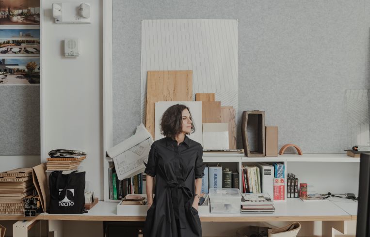 A woman in an office.