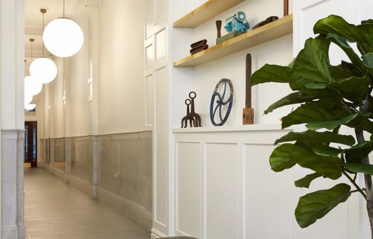 Kaufman reclaimed some retail space from next door to create the alcove shelves and seating.