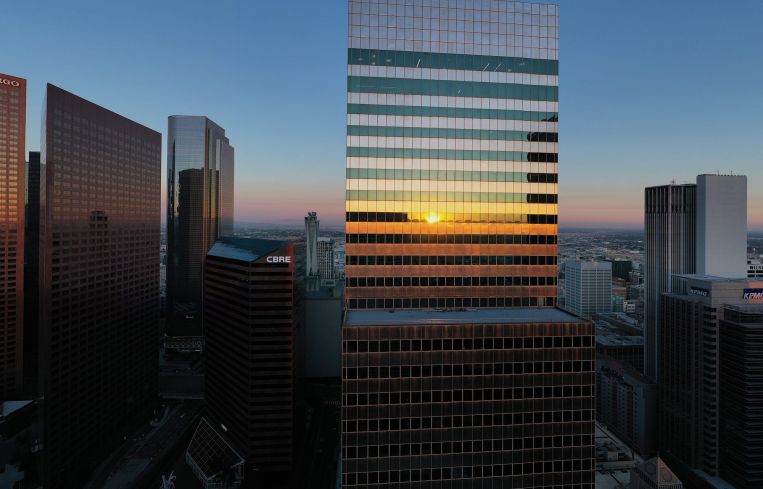 An aerial view shows the tower at 444 South Flower in the downtown Financial District