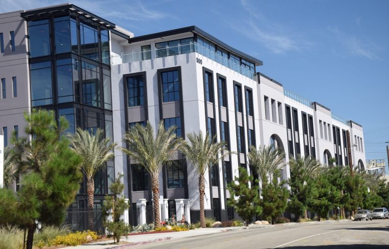 The 150,451-square-foot Class A creative office campus, located at 500 and 540 South Santa Fe Avenue near the Los Angeles River and 4th Street bridge, currently sits vacant.