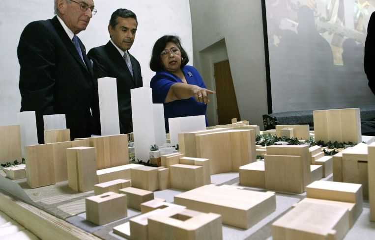 Looking at a model for the Grand Avenue project inside the Walt Disney Concert Hall: Eli Broad, chairman of the Grand Avenue Committee, with then-Mayor-Elect Antonio Villaraigosa, and L.A. County Supervisor Gloria Molina, Chair of the L.A. Grand Avenue Authority. The authority voted unanimously to approve the master plan by the Related Companies. The development covered a 16-acre civic park with up to 3.5 million square feet of development on nine acres in Downtown L.A.