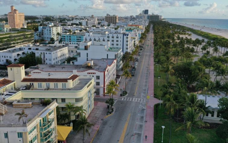 In this aerial view from a drone, desolate Ocean Drive is seen after most visitors have checked out of their hotels on March 24, 2020 in Miami Beach, Florida.