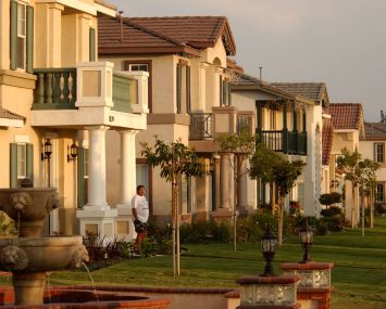 New houses line the street in in Ontario, Calif., located in the Inland Empire, the area east of Los Angeles, in Riverside and San Bernardino Counties.