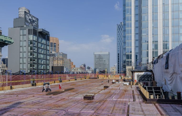 Tribeca recently started work on the building's two-story penthouse addition.
