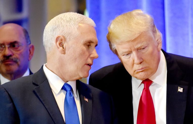 Three men standing.