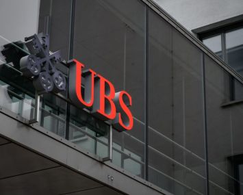 This photograph taken on March 3, 2021 in Zurich shows a sign of Swiss banking giant UBS on their headquarters.