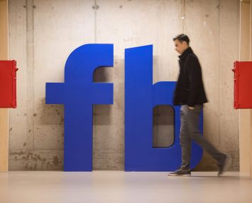 The Facebook logo at Facebook's Frank Gehry-designed headquarters in London.