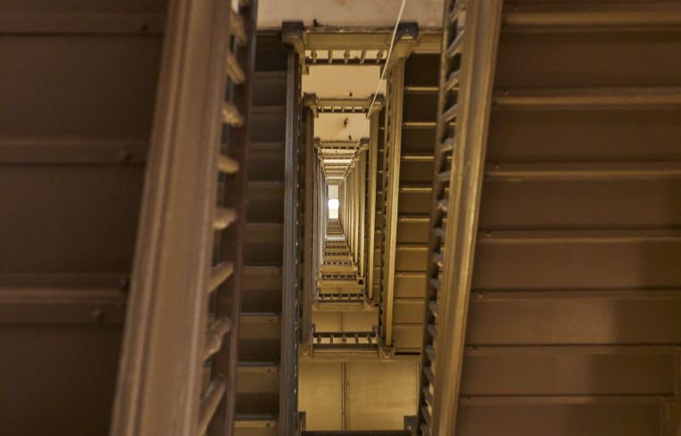 The staircase in the Flatiron is being completely disassembled as part of the renovation, because it's the only stairway that allows workers to exit in the event of a fire. The reconfigured core will include two staircases, new bathrooms on each floor and new destination dispatch elevator systems.