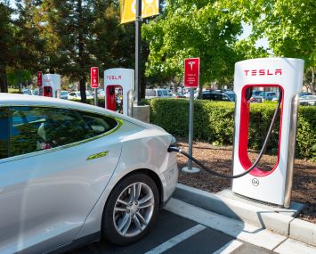 A Tesla automobile plugged in and charging in Mountain View, Calif.