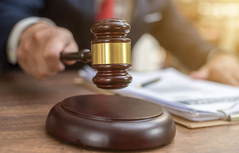 Man holding gavel