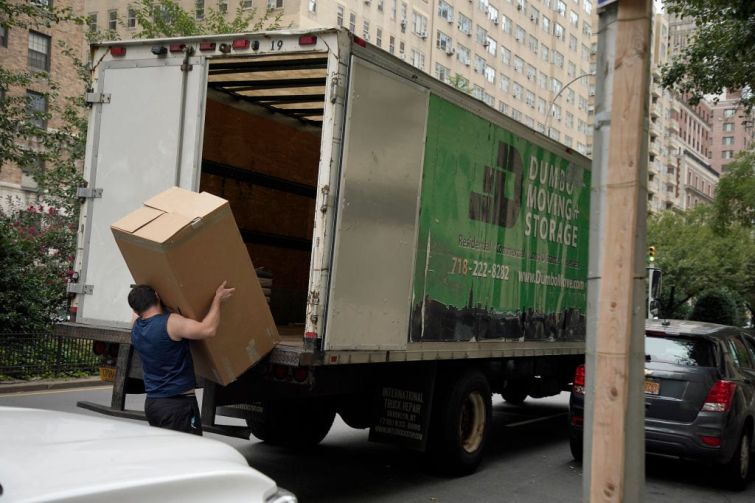 A mover unloads a truck on August 31, 2020 in New York City.