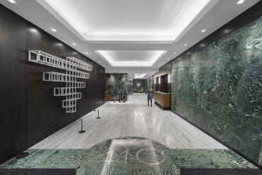 Global Holdings repurposed the existing green marble in the renovation of the lobby of 410 Park Avenue. 
