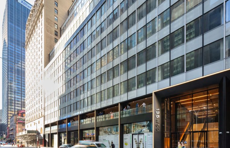 The facade was reclad with new windows and lighter-colored spandrels.