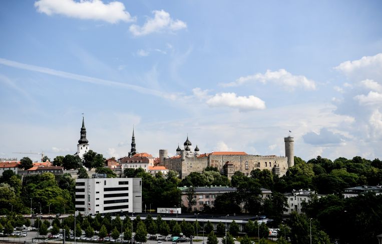 The skyline of a small city from a distance.