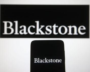 In this photo illustration, Blackstone Group Inc. logo of a