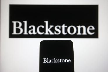 In this photo illustration, Blackstone Group Inc. logo of a