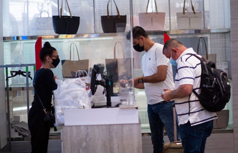 People shopping in Macy's