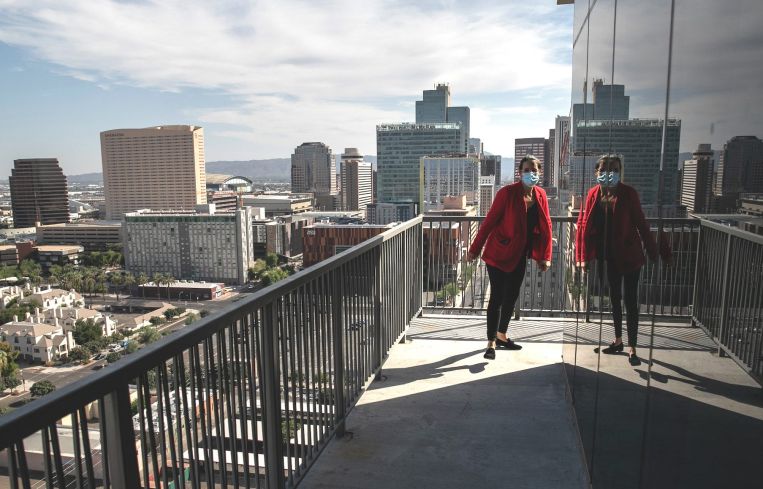 A property manager inspects a high rise apartment after a constable arrived to post an eviction order in Phoenix, Arizona. Thousands of court-ordered evictions continue nationwide despite a Centers for Disease Control (CDC) moratorium for renters impacted by the coronavirus pandemic. Although state and county officials say they have tried to educate the public on the protections, many renters remain unaware and fail to complete the necessary forms to remain in their homes.