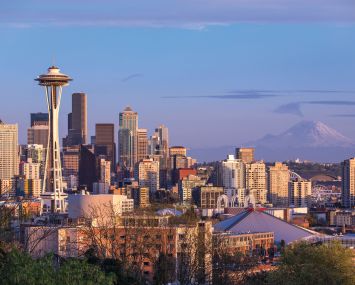 Seattle's iconic skyline with Mount Rainier in the distance.