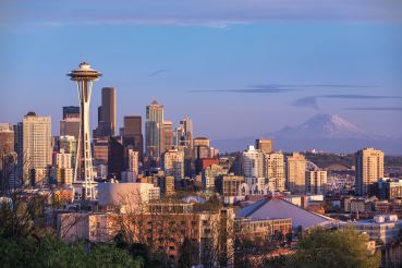 Seattle's iconic skyline with Mount Rainier in the distance.