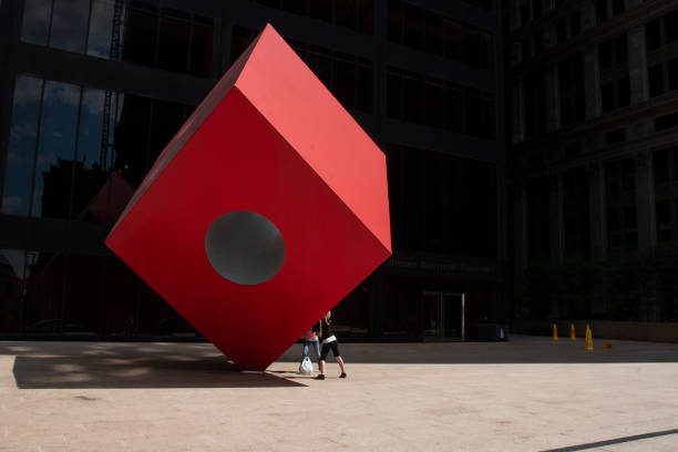 Isamu Noguchi's Red Cube in front of 140 Broadway.
