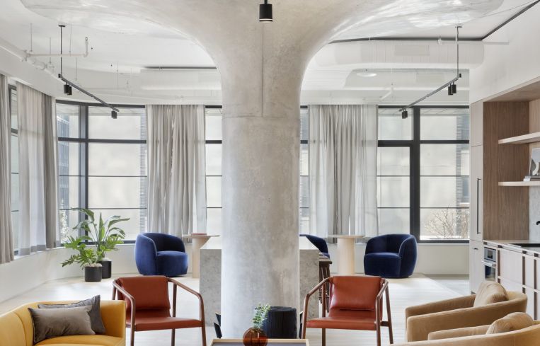 The designers at Fogarty Finger put in uplighting to highlight the building's large columns, which are a remnant of its history as a warehouse.