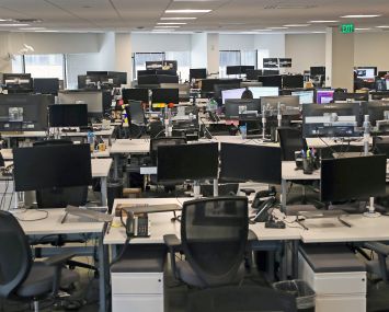 Empty rows of desks.