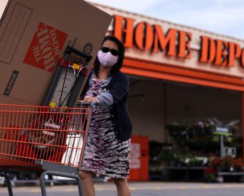 A shopper leaves a Home Depot with merchandise last month. Shares of Home Depot dropped more than 4 percent in the second quarter, although profits surpassed analysts expectations.