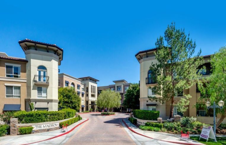 The property is located at 24555 Town Center Drive in the neighborhood of Valencia.