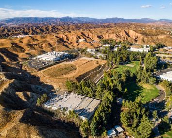 The industrial and life sciences business park spanning 118.5 acres was owned by funds managed by L.A.-based firms Oaktree Capital Management and Intertex Companies.
