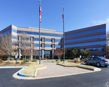 One of two mid-rise office buildings that make up Perimeter Center, a site within the massive, 3,800-acre Cummings Research Park.