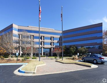 One of two mid-rise office buildings that make up Perimeter Center, a site within the massive, 3,800-acre Cummings Research Park.