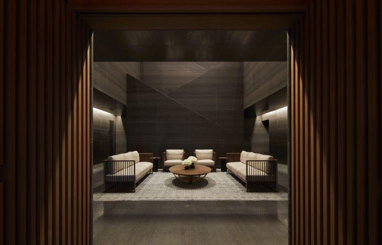 The main entryway features dark limestone walls and is arranged to mimic the courtyard of a traditional Middle Eastern home.