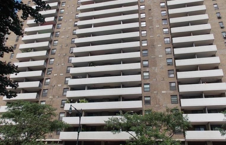 A large grey and white apartment building on the Upper West Side.