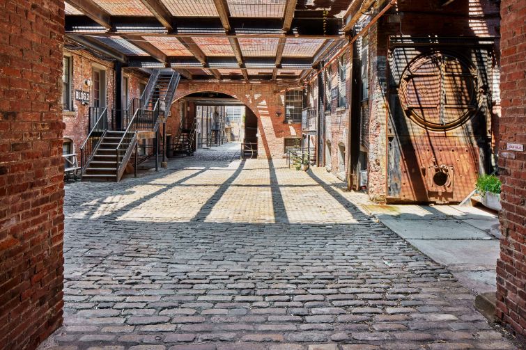 The nine-building property on the Newtown Creek waterfront has a 250-foot-long interior courtyard.
