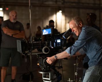 US cinematographer Richard Crudo, right, assists interns as they shoot a scene during a session of the Academy Gold Production Track Program at Warner Bros Ranch in Burbank in 2019.