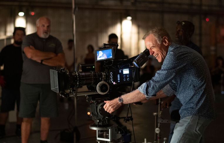 US cinematographer Richard Crudo, right, assists interns as they shoot a scene during a session of the Academy Gold Production Track Program at Warner Bros Ranch in Burbank in 2019.