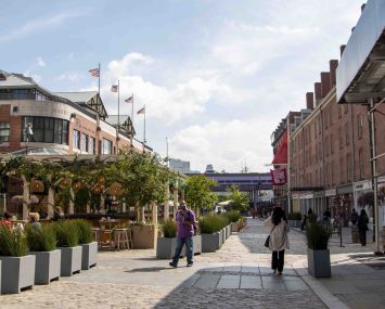 A parking lot near the historic South Street Seaport is set to be redeveloped with a 30-story mixed-use tower, despite opposition from local residents and preservationists.