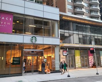 Exterior of the new Starbucks and Amazon combo store at 111 East 59th Street.